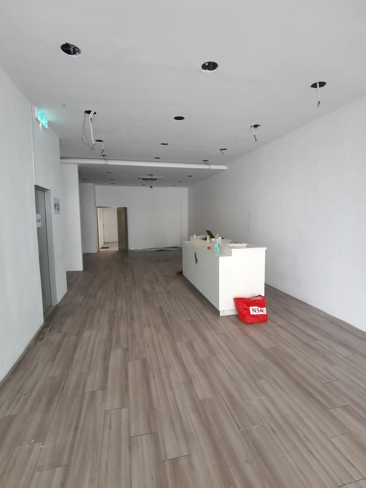White commercial interior after fit-out dismantling in Bangi
